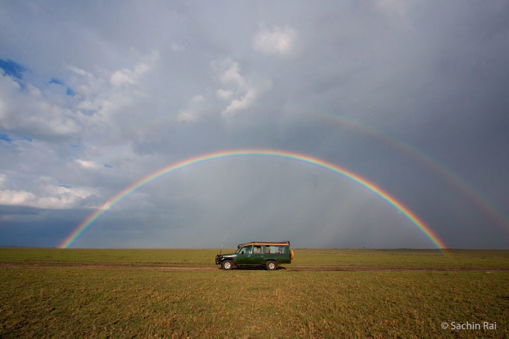 Vehicle and Rainbow, Masai Mara